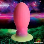 XR Brands Creature Cocks silikonowe jajko XL świecące w ciemności, żebrowane, multikolor